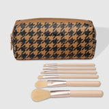 The Louenhide Brianna Makeup Bag is the perfect addition to your beauty routine. Exude style on your next adventure with the visually captivating camel and black houndstooth pattern. Complete with a set of makeup brushes, this women’s small makeup bag is the perfect size for travel.
