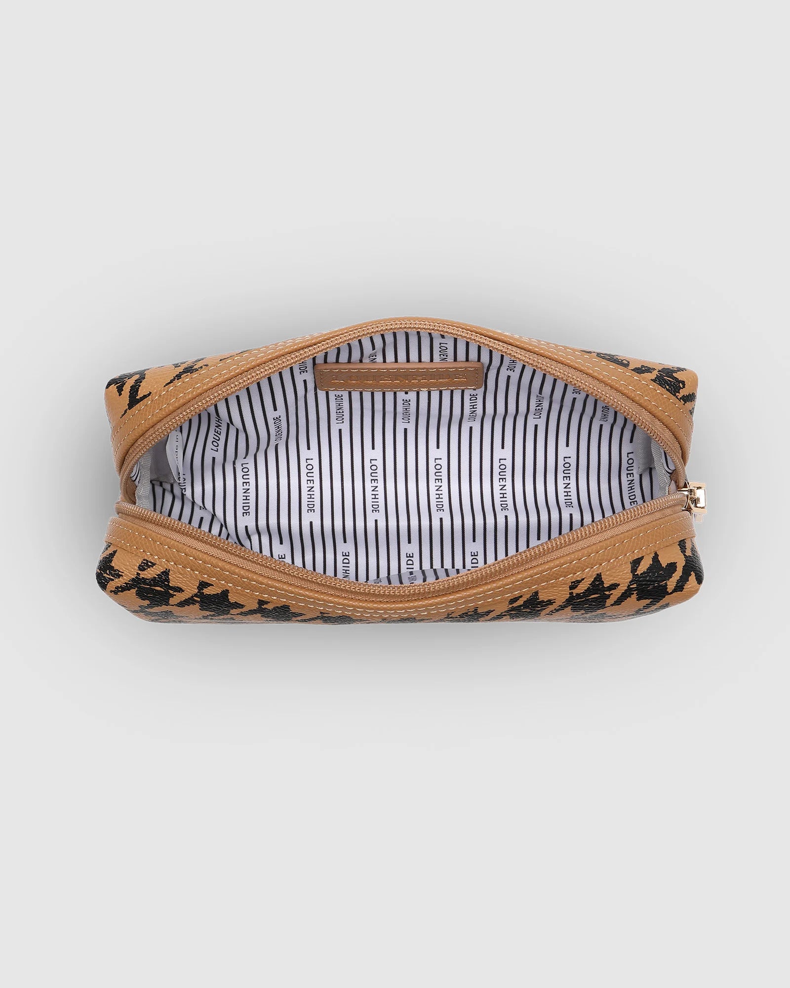 The Louenhide Brianna Makeup Bag is the perfect addition to your beauty routine. Exude style on your next adventure with the visually captivating camel and black houndstooth pattern. Complete with a set of makeup brushes, this women’s small makeup bag is the perfect size for travel.