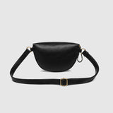 The Louenhide Cassidy Belt Bag is a bold staple designed to add a statement finish to your everyday styling. Crafted in a structured faux leather and adorned with refined hardware accents, this studded bag blends functionality with elevated design. The curved silhouette sits comfortably against the body, while the adjustable strap offers the option to wear it as a classic belt bag or crossbody style - making it one of the best sling bag options for hands-free ease. Compact yet roomy enough for your on-the-g