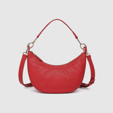 The Louenhide Corfu Handbag is a stunning accessory that combines function and style flawlessly. Perfect for both casual and formal occasions, the stylish crescent moon silhouette will add a touch of elegance and intrigue to your outfit. Accented by contrast feature stitching and light gold hardware, the Corfu is the ideal companion for your vacation wardrobe and pairs beautifully with flowing linens and patterned silks. With multiple ways to wear, style this convertible handbag as an evening bag with the d