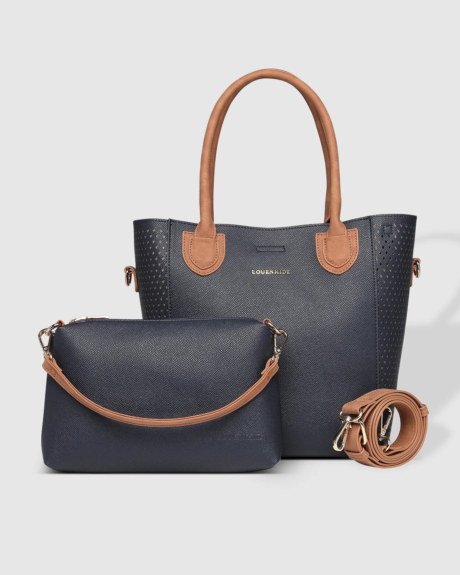 The Louenhide Dublin Tote Bag is designed to elevate your style and organize your daily essentials, making it the perfect accessory for everyday errands. Tucked inside, the additional clutch offers a convenient way to keep your valuables secure or choose to carry it as a separate crossbody bag for quick trips out. Wear this tote as a traditional handbag on your shoulder or effortlessly transform it into a crossbody bag with the adjustable vegan leather strap. For comfort and ease wherever you go,