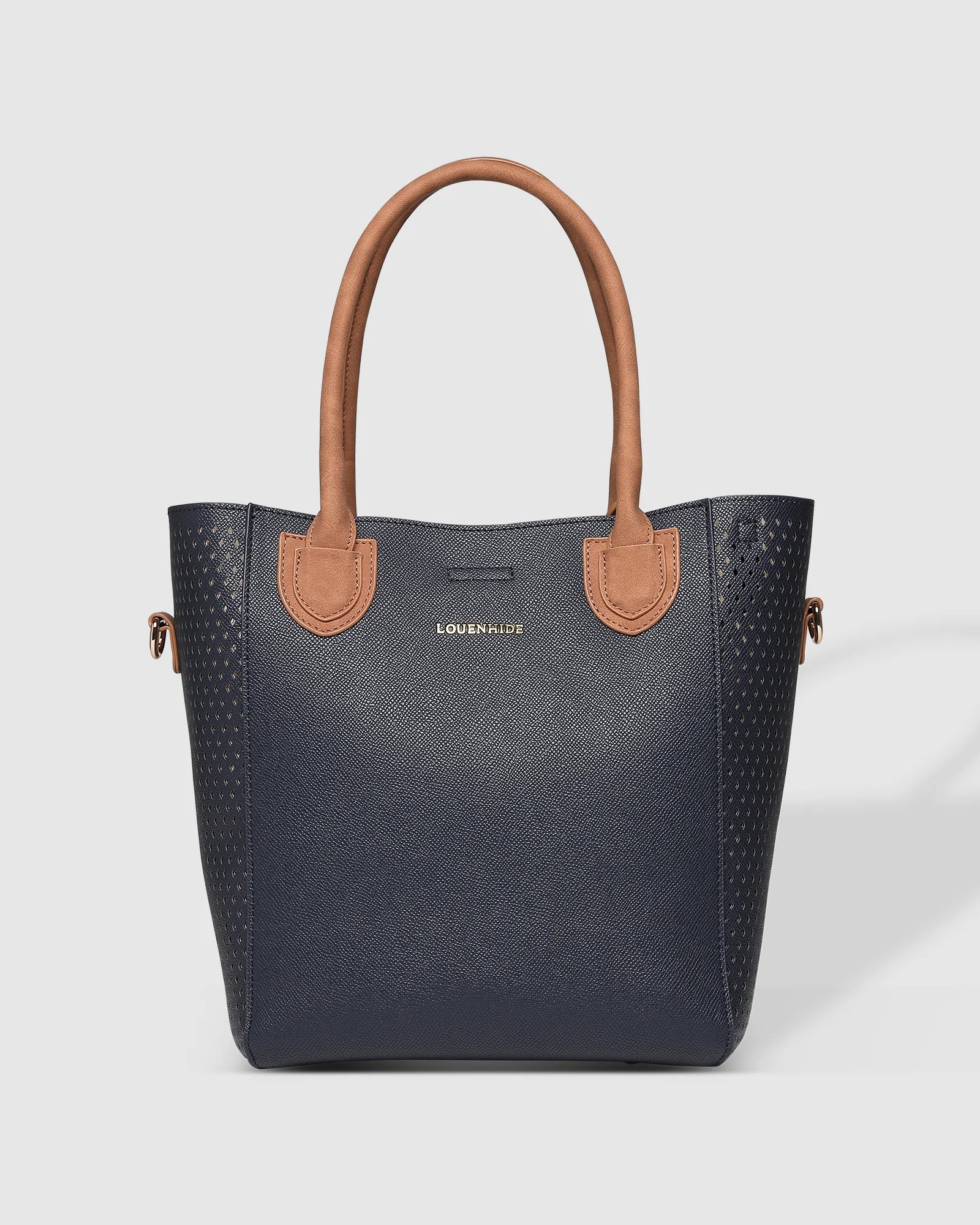The Louenhide Dublin Tote Bag is designed to elevate your style and organize your daily essentials, making it the perfect accessory for everyday errands. Tucked inside, the additional clutch offers a convenient way to keep your valuables secure or choose to carry it as a separate crossbody bag for quick trips out. Wear this tote as a traditional handbag on your shoulder or effortlessly transform it into a crossbody bag with the adjustable vegan leather strap. For comfort and ease wherever you go,