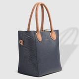 The Louenhide Dublin Tote Bag is designed to elevate your style and organize your daily essentials, making it the perfect accessory for everyday errands. Tucked inside, the additional clutch offers a convenient way to keep your valuables secure or choose to carry it as a separate crossbody bag for quick trips out. Wear this tote as a traditional handbag on your shoulder or effortlessly transform it into a crossbody bag with the adjustable vegan leather strap. For comfort and ease wherever you go,