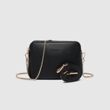 The Louenhide Elle Crossbody Bag is the elevated staple your wardrobe has been waiting for. Designed with a compact rectangular silhouette, this triple compartment crossbody bag keeps your essentials streamlined and organized without compromising style. To switch up your look with ease, opt for the gold chain strap to elevate your dressier on-the-go moments or swap to the matching faux leather strap for an casual feel. Adorned with light gold hardware, this multi-zipper crossbody bag is designed to carry
