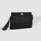 The Louenhide Fern Raffia Crossbody is the ultimate accessory for your summer getaway. Doubling as a crossbody or clutch, it embodies the essence of sun-soaked adventures and chic style.