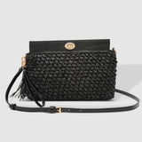 The Louenhide Fern Raffia Crossbody is the ultimate accessory for your summer getaway. Doubling as a crossbody or clutch, it embodies the essence of sun-soaked adventures and chic style.