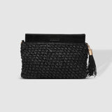 The Louenhide Fern Raffia Crossbody is the ultimate accessory for your summer getaway. Doubling as a crossbody or clutch, it embodies the essence of sun-soaked adventures and chic style.