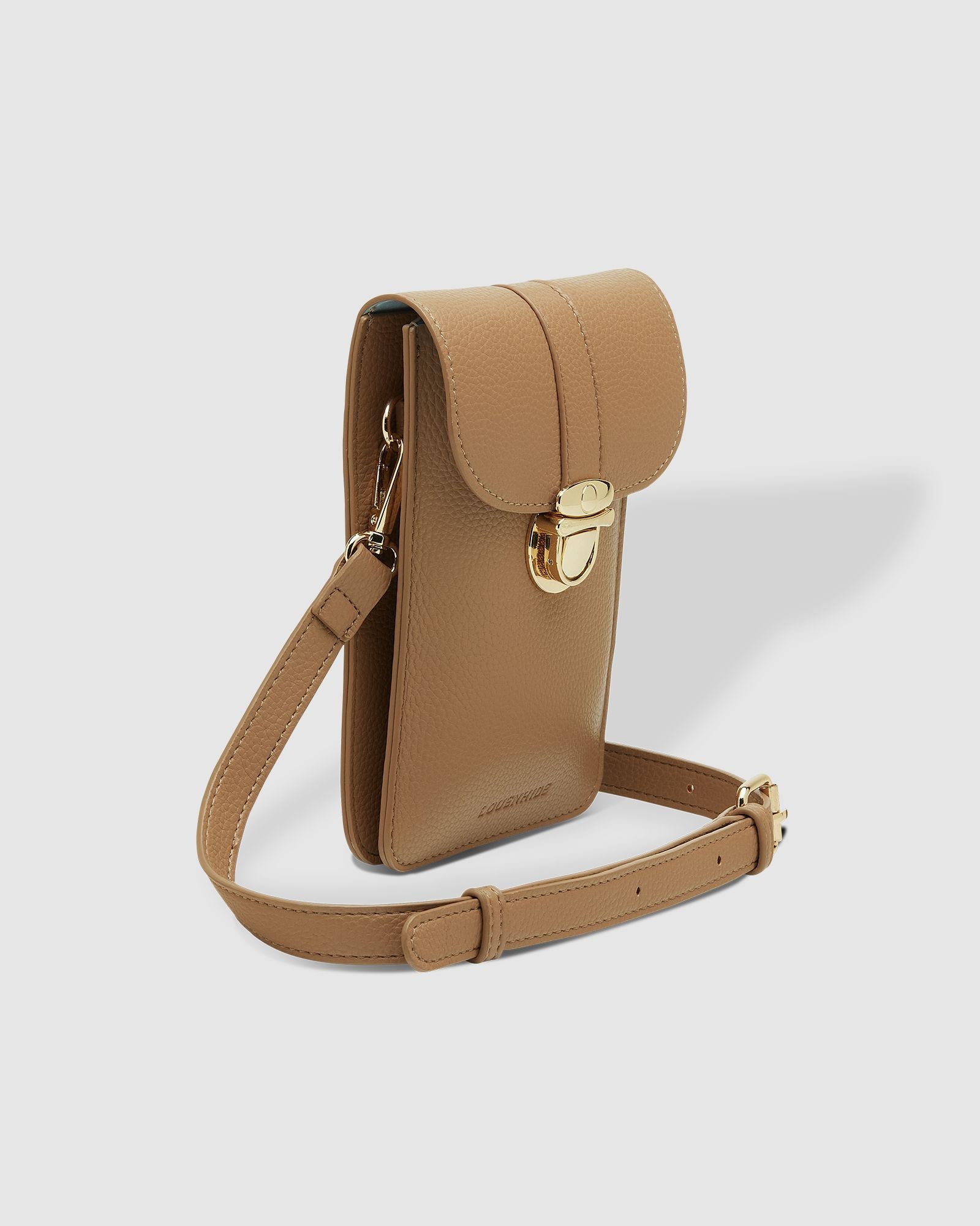 The Louenhide Fontaine Phone Crossbody Bag is the perfect accessory. While offering versatility and fuss-free functionality to your day-to-day life, you can keep your phone and everyday essentials within reach without sacrificing style.