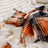 The Louenhide Glasgow Scarf is a timeless tartan pattern in gorgeous winter colourways.