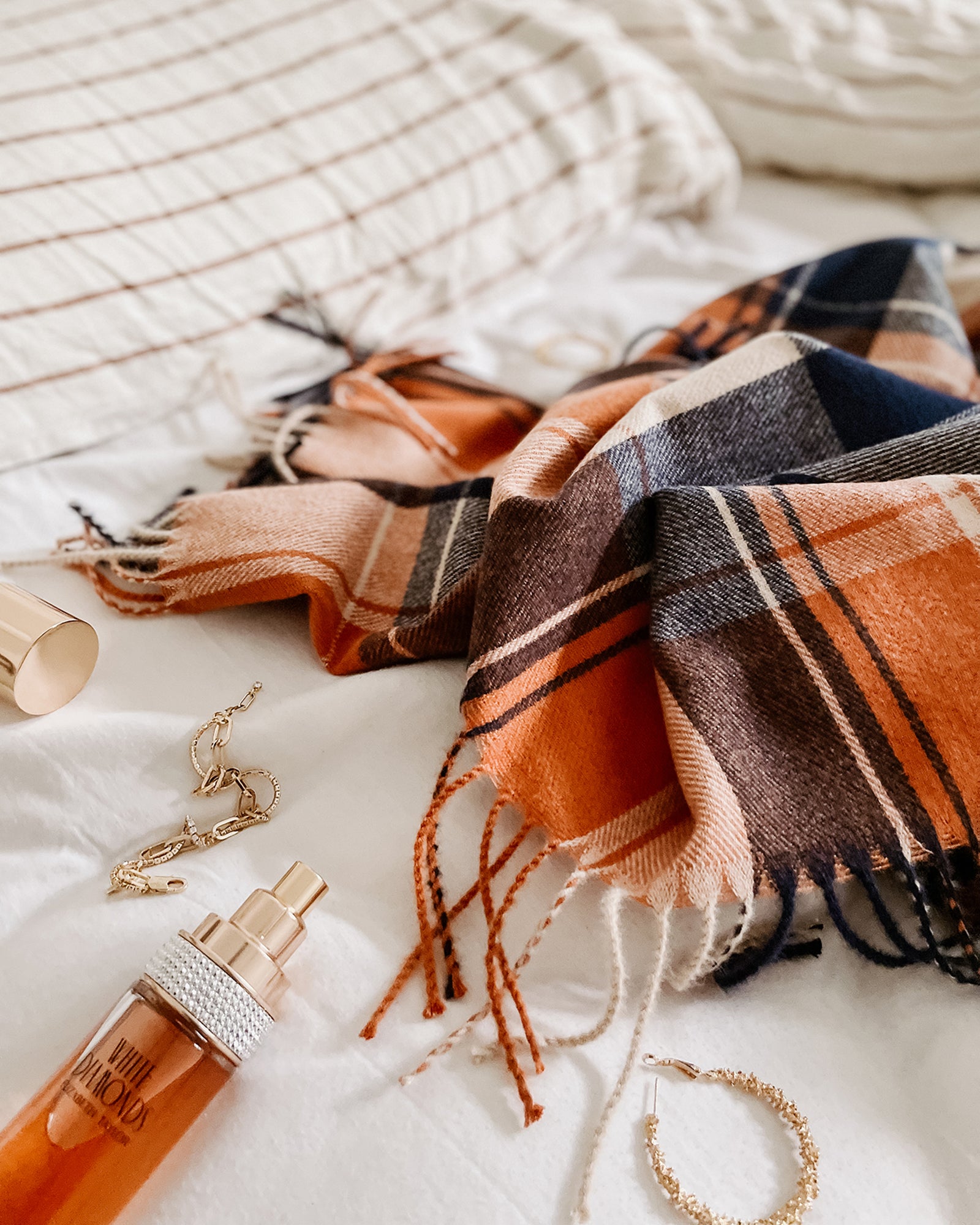 The Louenhide Glasgow Scarf is a timeless tartan pattern in gorgeous winter colourways.
