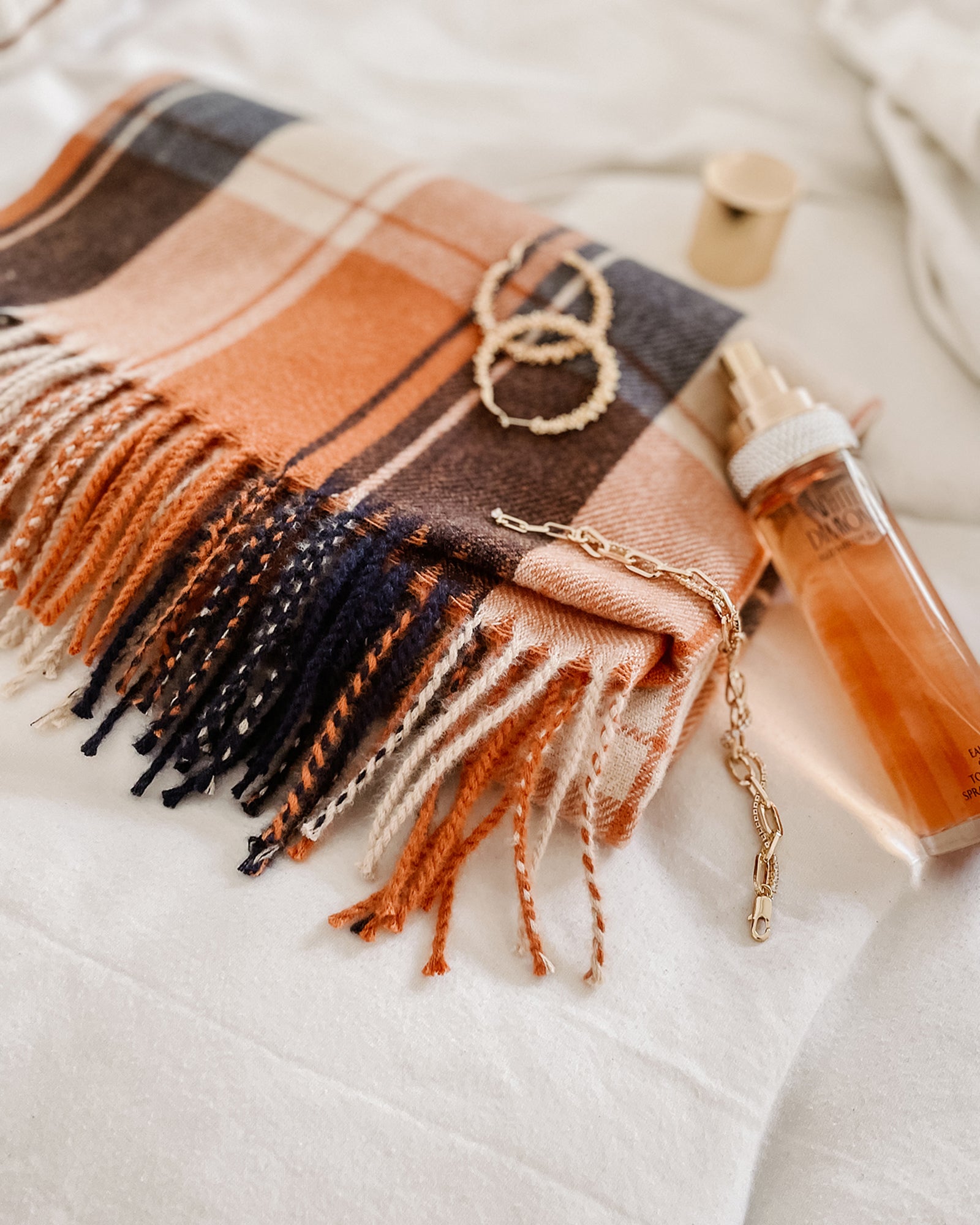 The Louenhide Glasgow Scarf is a timeless tartan pattern in gorgeous winter colourways.