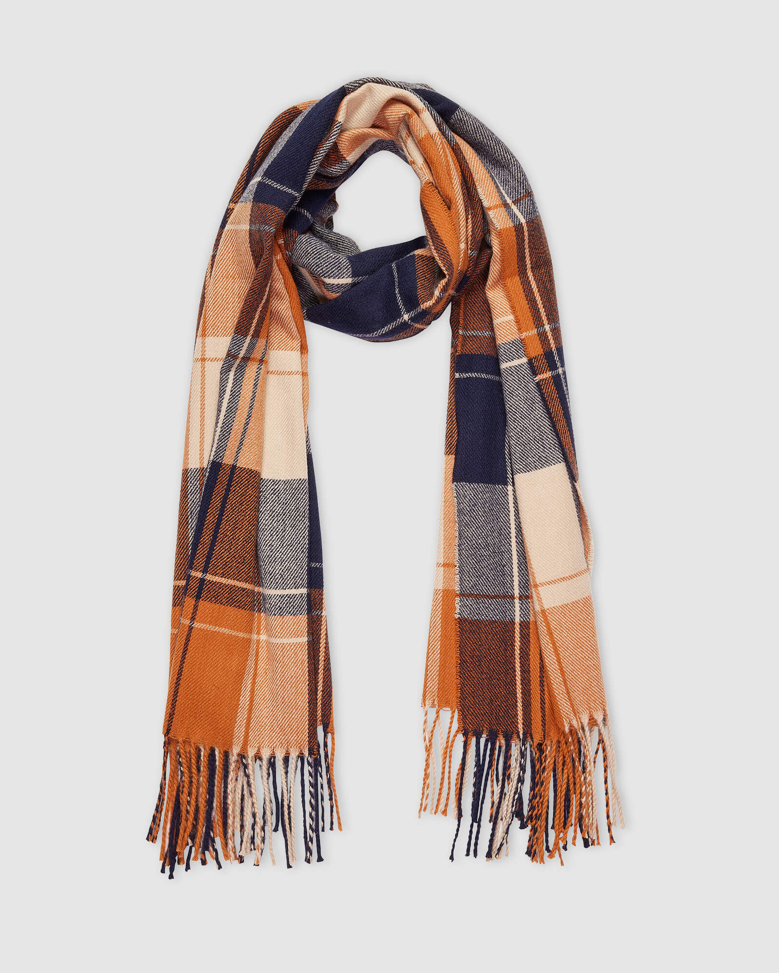 The Louenhide Glasgow Scarf is a timeless tartan pattern in gorgeous winter colourways.
