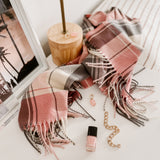 The Louenhide Glasgow Scarf is a timeless tartan pattern in gorgeous winter colourways.