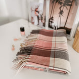 The Louenhide Glasgow Scarf is a timeless tartan pattern in gorgeous winter colourways.