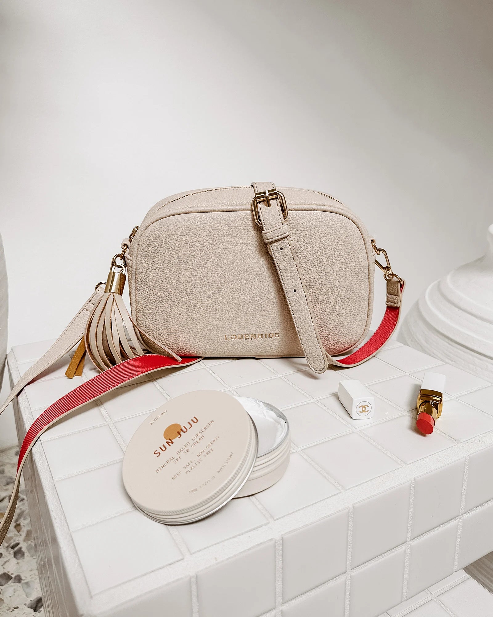 The Louenhide Jacinta Crossbody Bag is the ultimate cool-girl bag, featuring a complimentary detachable guitar strap.