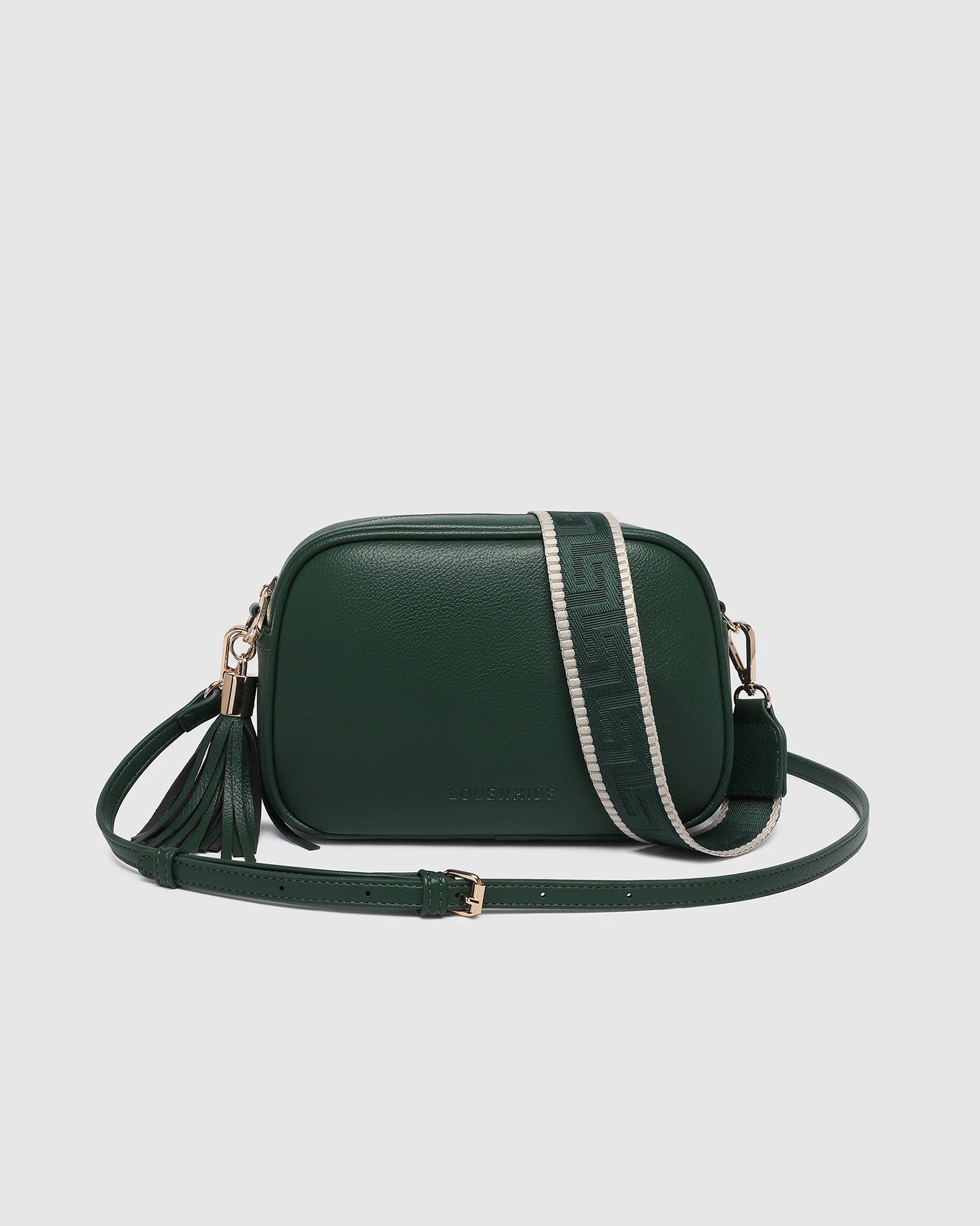The Louenhide Jacinta Crossbody Bag with Gia Strap is the ultimate everyday bag for women looking for style without compromising function. Now in new season pastel colours and paired with a stylish matching guitar strap, feel luxe and sporty with this soft, camera style bag over your shoulder. Walk out in style with this casual crossbody bag and keep your essentials secure with its slip and zip pockets. The Jacinta is a staple in the Louenhide world, loved by women of all ages and style.
