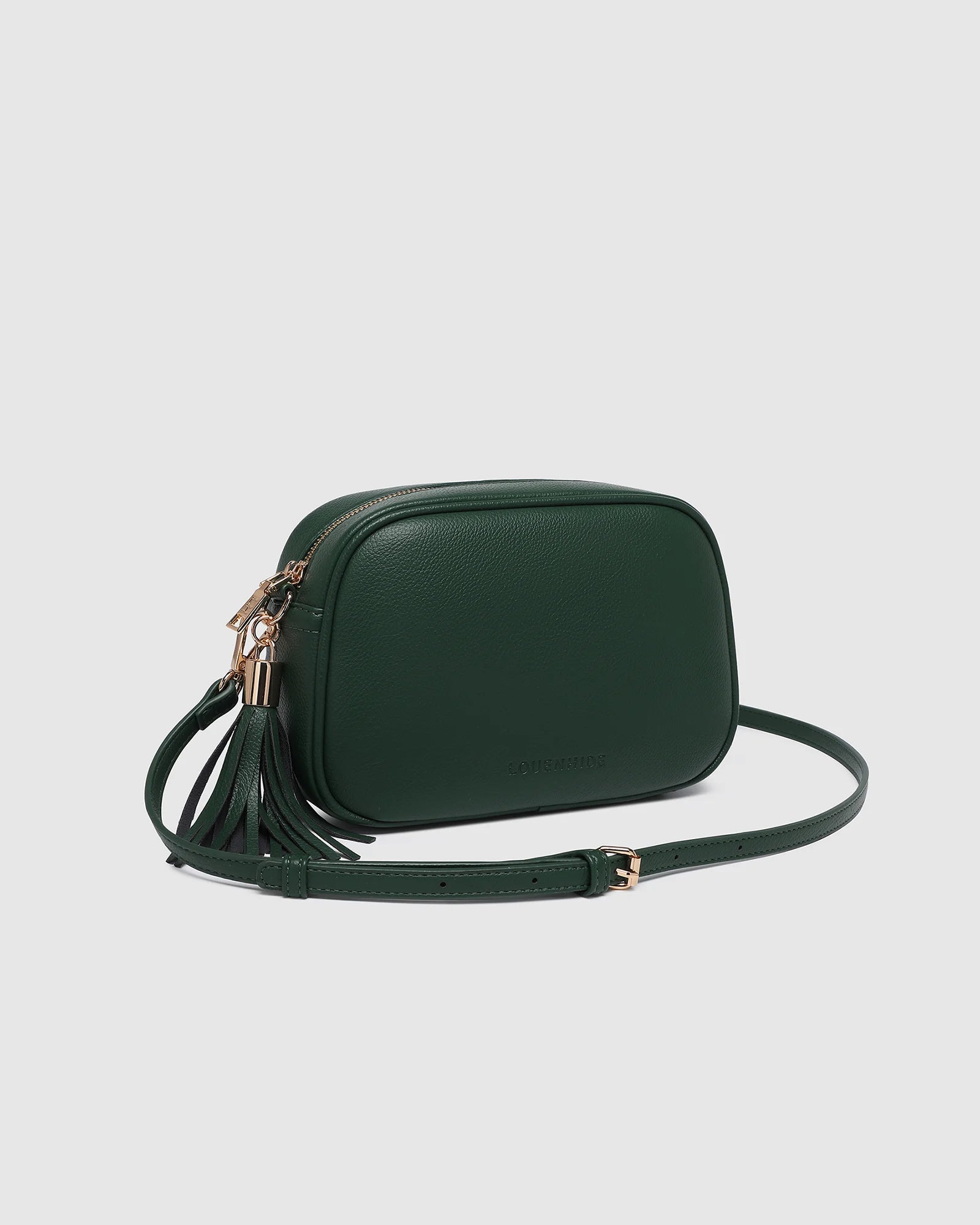 The Louenhide Jacinta Crossbody Bag with Gia Strap is the ultimate everyday bag for women looking for style without compromising function. Now in new season pastel colours and paired with a stylish matching guitar strap, feel luxe and sporty with this soft, camera style bag over your shoulder. Walk out in style with this casual crossbody bag and keep your essentials secure with its slip and zip pockets. The Jacinta is a staple in the Louenhide world, loved by women of all ages and style.