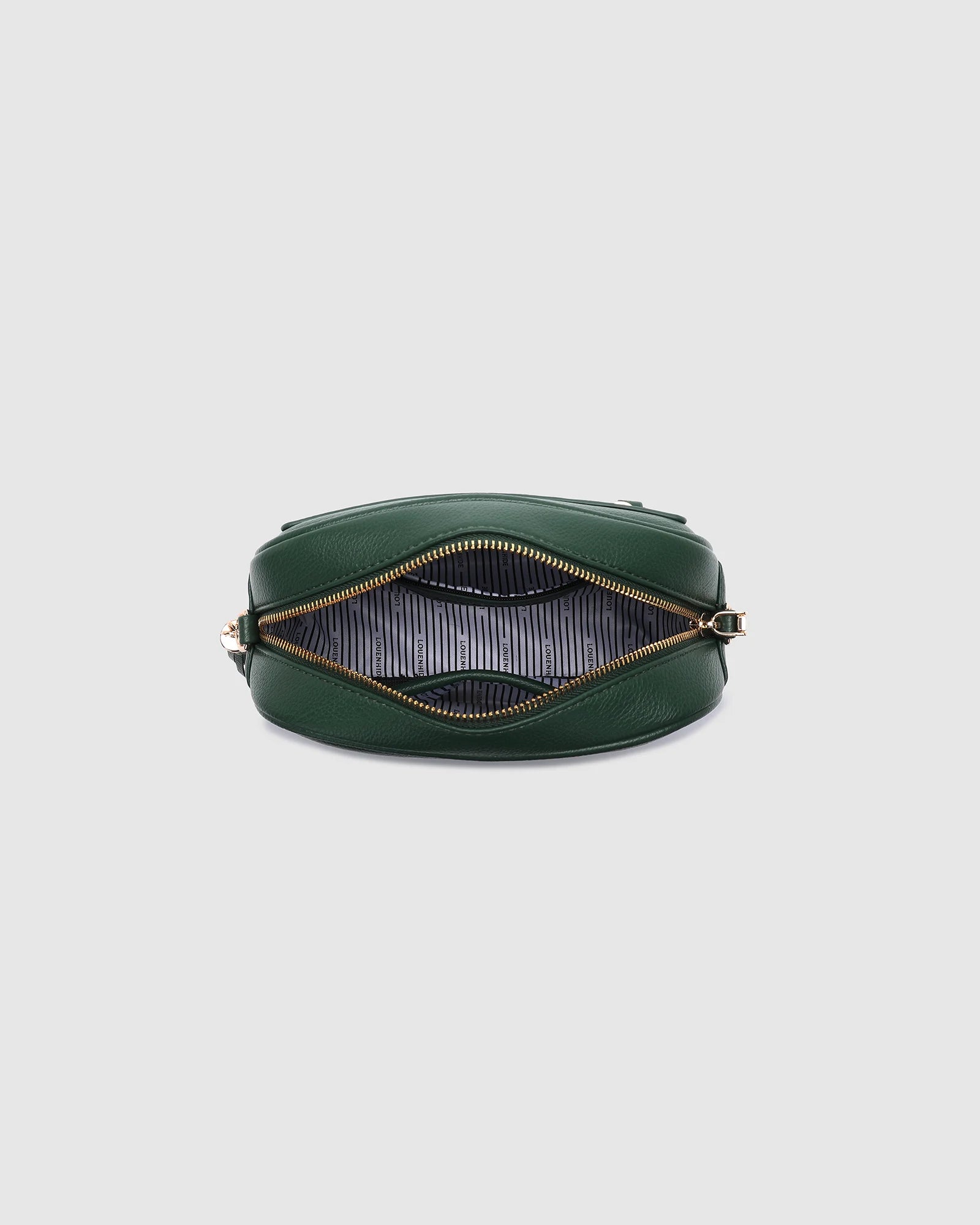The Louenhide Jacinta Crossbody Bag with Gia Strap is the ultimate everyday bag for women looking for style without compromising function. Now in new season pastel colours and paired with a stylish matching guitar strap, feel luxe and sporty with this soft, camera style bag over your shoulder. Walk out in style with this casual crossbody bag and keep your essentials secure with its slip and zip pockets. The Jacinta is a staple in the Louenhide world, loved by women of all ages and style.