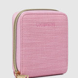 The Louenhide Juniper Jewelry Case is ideal for those who appreciate the finer details in their jewelry storage. Designed with your dynamic lifestyle in mind, this jewellery wallet is compact and portable. Whether placed on your vanity at home or tucked into your luggage for travel, the Juniper ensures your favourite pieces are protected wherever you go. Organize your pieces with the two press stud hooks, slip pocket, drawstring bag, ring roll and earring press stud band. Structured and protecte