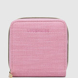 The Louenhide Juniper Jewelry Case is ideal for those who appreciate the finer details in their jewelry storage. Designed with your dynamic lifestyle in mind, this jewellery wallet is compact and portable. Whether placed on your vanity at home or tucked into your luggage for travel, the Juniper ensures your favourite pieces are protected wherever you go. Organize your pieces with the two press stud hooks, slip pocket, drawstring bag, ring roll and earring press stud band. Structured and protecte