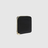 The Louenhide Juniper Jewelry Case is ideal for those who appreciate the finer details in their jewelry storage. Designed with your dynamic lifestyle in mind, this jewellery wallet is compact and portable. Whether placed on your vanity at home or tucked into your luggage for travel, the Juniper ensures your favourite pieces are protected wherever you go. Organize your pieces with the two press stud hooks, slip pocket, drawstring bag, ring roll and earring press stud band. Structured and protected, th