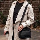 The Louenhide London Crossbody Bag strikes the perfect balance between simplicity and style. While the classic, compact, camera-bag shape is perfect for storing more than the everyday essentials, the multi-compartment design keeps everything you need within reach. From your phone, wallet and keys to your digital camera, a small water bottle and more - when life is on-the-go, take a bag that’s built for movement. Featuring an adjustable webbing strap to ensure comfort, this women’s crossbody bag is the idea