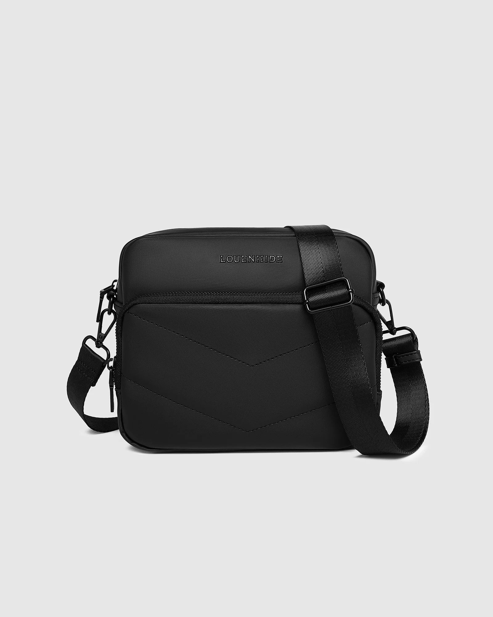 The Louenhide London Crossbody Bag strikes the perfect balance between simplicity and style. While the classic, compact, camera-bag shape is perfect for storing more than the everyday essentials, the multi-compartment design keeps everything you need within reach. From your phone, wallet and keys to your digital camera, a small water bottle and more - when life is on-the-go, take a bag that’s built for movement. Featuring an adjustable webbing strap to ensure comfort, this women’s crossbody bag is the idea