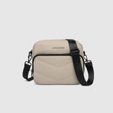 The Louenhide London Crossbody Bag strikes the perfect balance between simplicity and style. While the classic, compact, camera-bag shape is perfect for storing more than the everyday essentials, the multi-compartment design keeps everything you need within reach. From your phone, wallet and keys to your digital camera, a small water bottle and more - when life is on-the-go, take a bag that’s built for movement. Featuring an adjustable webbing strap to ensure comfort, this women’s crossbody bag is the