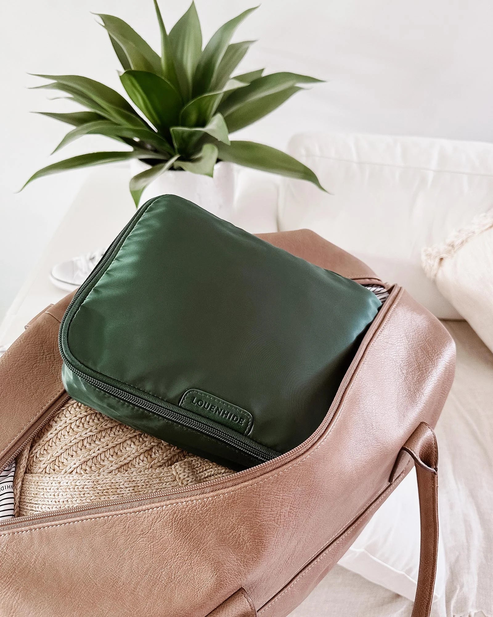 The Louenhide Madras 3 Piece Packing Cube Set will transform the way you travel. Maximize space and minimize bulk with the three varied sizes in three complementary hues. Use the smaller cube for your personal items, the medium for lighter pieces and the largest cube for your chunky knits and jeans.