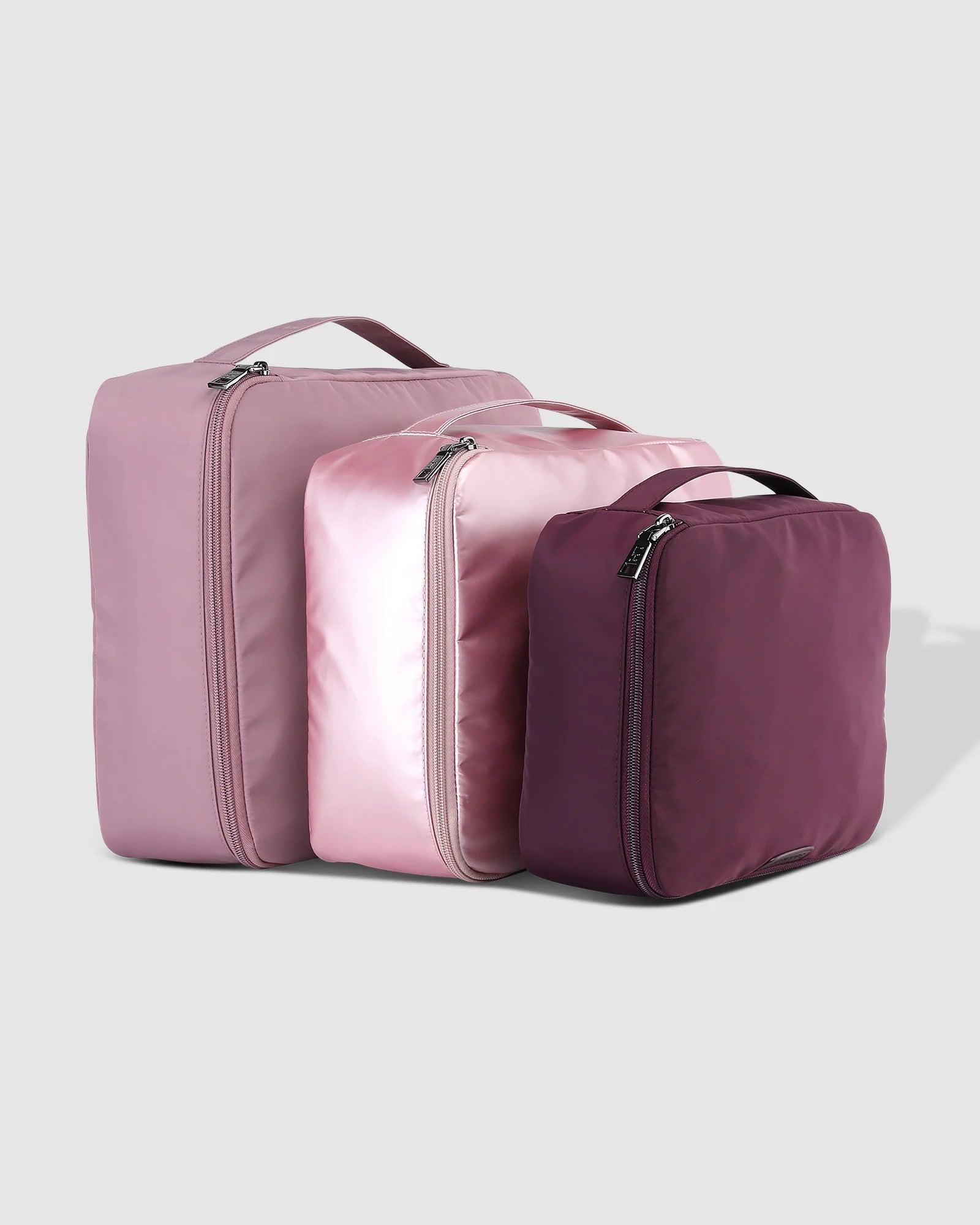 The Louenhide Madras 3 Piece Packing Cube Set will transform the way you travel. Maximize space and minimize bulk with the three varied sizes in three complementary hues. Use the smaller cube for your personal items, the medium for lighter pieces and the largest cube for your chunky knits and jeans.