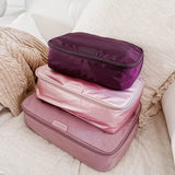 The Louenhide Madras 3 Piece Packing Cube Set will transform the way you travel. Maximize space and minimize bulk with the three varied sizes in three complementary hues. Use the smaller cube for your personal items, the medium for lighter pieces and the largest cube for your chunky knits and jeans.