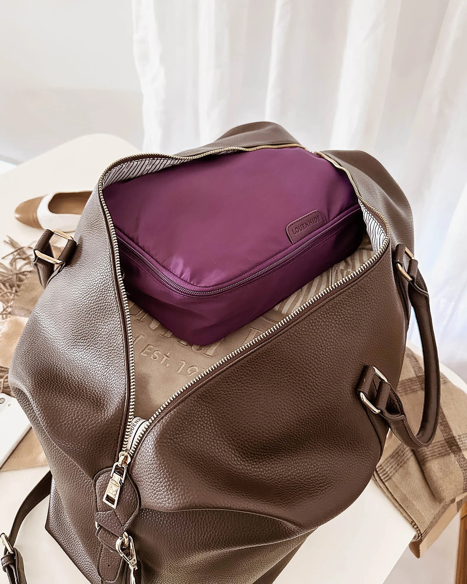 The Louenhide Madras 3 Piece Packing Cube Set will transform the way you travel. Maximize space and minimize bulk with the three varied sizes in three complementary hues. Use the smaller cube for your personal items, the medium for lighter pieces and the largest cube for your chunky knits and jeans.