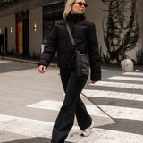 The Louenhide Miami Water Bottle Bag is a sleek, hands-free essential for an active, on-the-go lifestyle. With its slim, modern silhouette, this nylon water bottle crossbody bag is designed for effortless movement while keeping your water bottle secure and within reach.