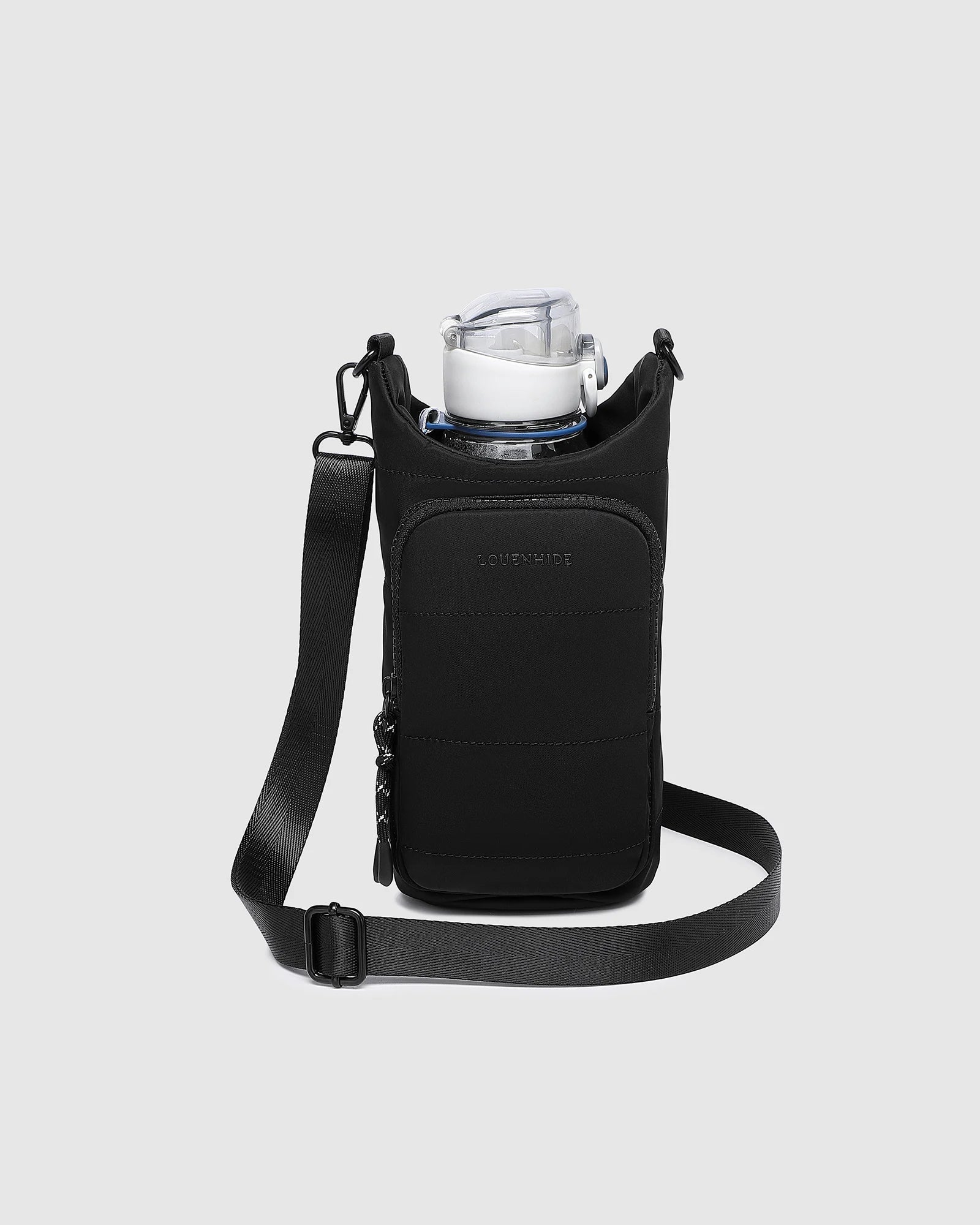 The Louenhide Miami Water Bottle Bag is a sleek, hands-free essential for an active, on-the-go lifestyle. With its slim, modern silhouette, this nylon water bottle crossbody bag is designed for effortless movement while keeping your water bottle secure and within reach.