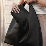 The Louenhide Monaco Everyday Pouch Set is a versatile duo that blends effortless style with practical functionality. Featuring the slouchy elegance of the Monaco Shoulder Bag and the clean design of the Everyday Pouch, this set is perfect for carrying and organizing your essentials with ease. Whether you’re heading to work, lunch with friends, or running errands, the Monaco’s spacious interior and the Everyday Pouch’s streamlined storage keep you stylishly prepared for any occasion. Seamlessly coordinated,