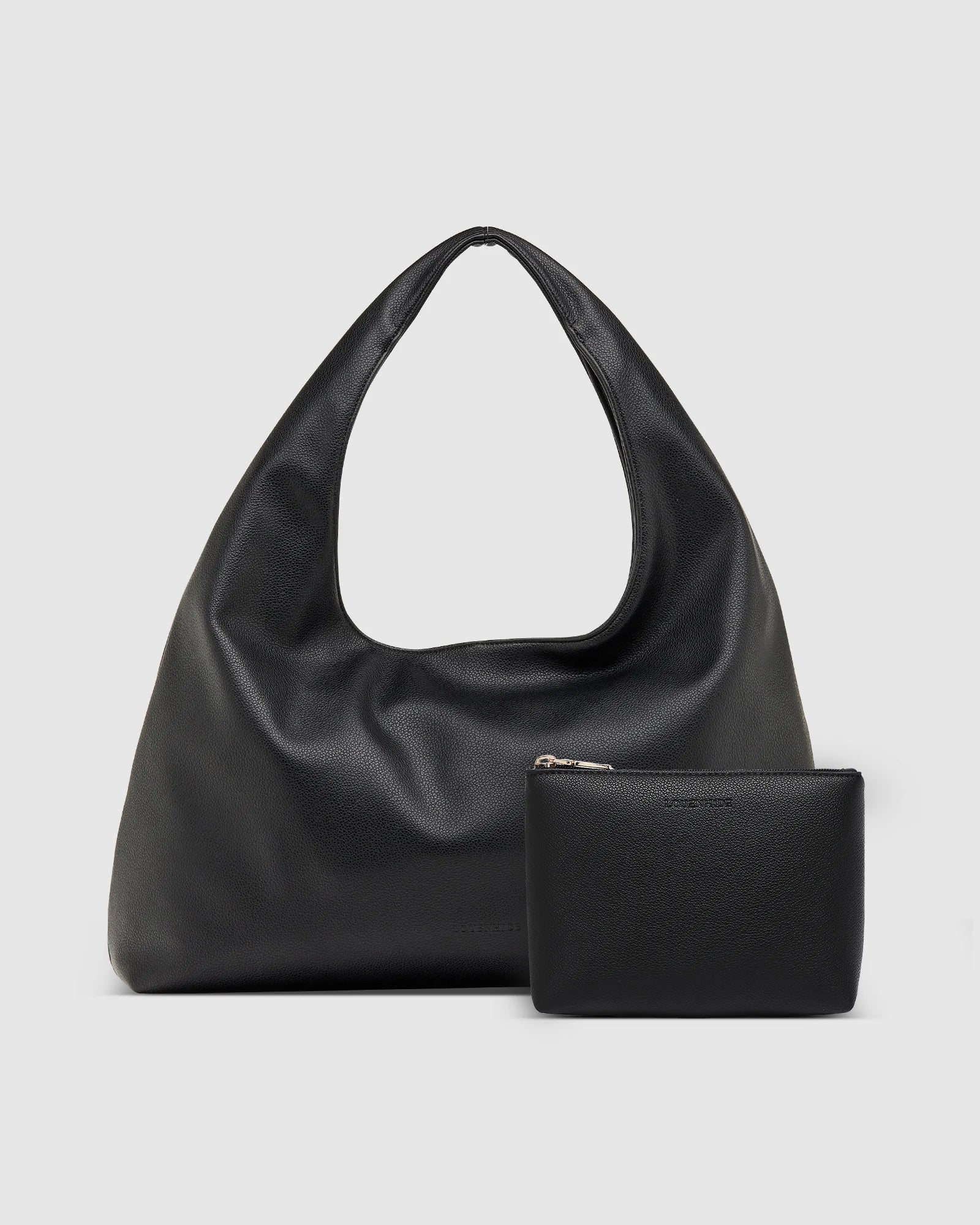 The Louenhide Monaco Everyday Pouch Set is a versatile duo that blends effortless style with practical functionality. Featuring the slouchy elegance of the Monaco Shoulder Bag and the clean design of the Everyday Pouch, this set is perfect for carrying and organizing your essentials with ease. Whether you’re heading to work, lunch with friends, or running errands, the Monaco’s spacious interior and the Everyday Pouch’s streamlined storage keep you stylishly prepared for any occasion. Seamlessly coordinated,