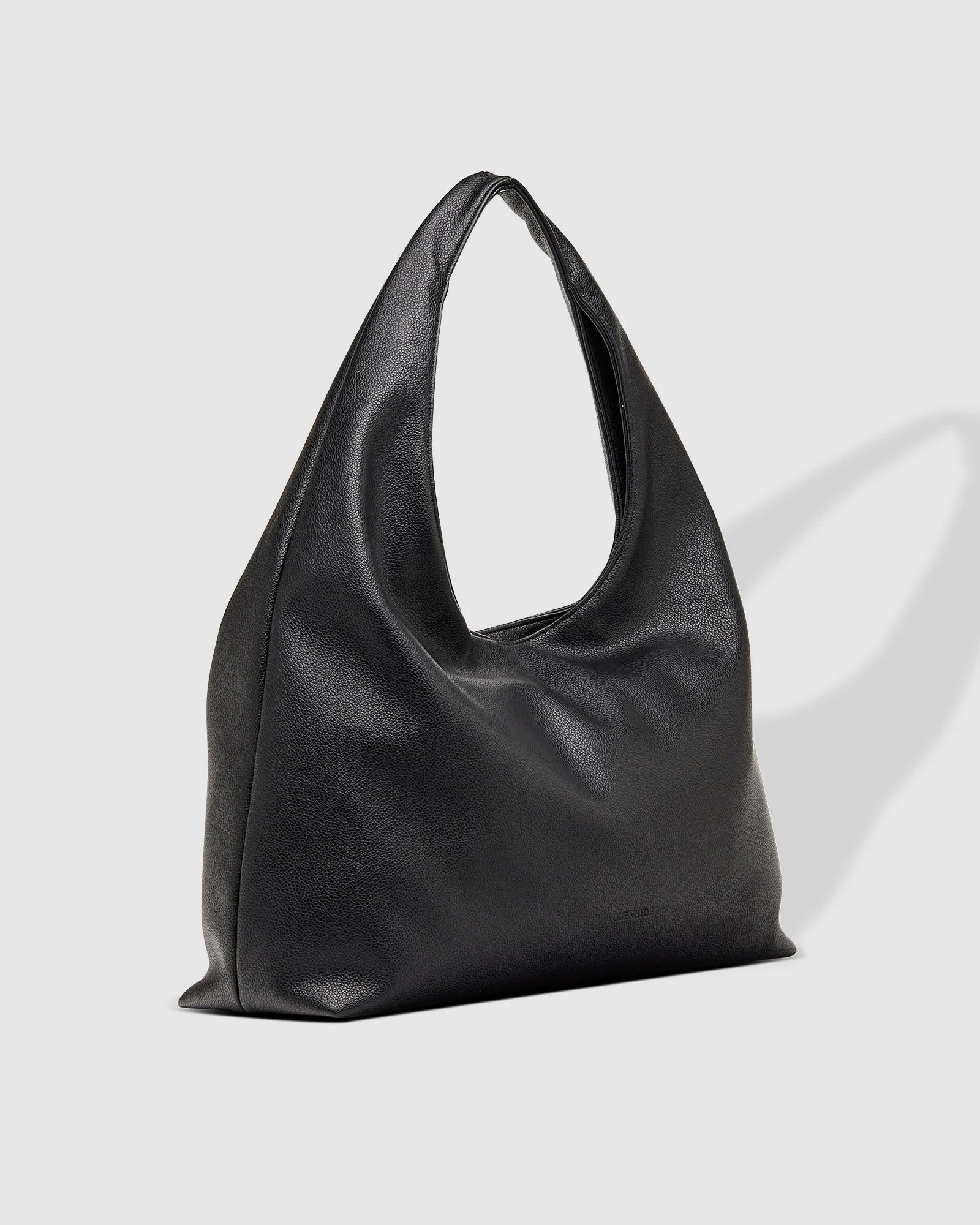 The Louenhide Monaco Everyday Pouch Set is a versatile duo that blends effortless style with practical functionality. Featuring the slouchy elegance of the Monaco Shoulder Bag and the clean design of the Everyday Pouch, this set is perfect for carrying and organizing your essentials with ease. Whether you’re heading to work, lunch with friends, or running errands, the Monaco’s spacious interior and the Everyday Pouch’s streamlined storage keep you stylishly prepared for any occasion. Seamlessly coordinated,