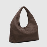 The Louenhide Monaco Shoulder Bag is the it-girl bag and our top seller. Whether it's a day at the office, a girls' lunch, or a casual outing, the Monaco is suited for any occasion. Her slouchy, minimalistic design adds a soft yet sleek element to the shoulder bags exterior while also allowing ample interior space to fit your everyday essentials and more. The seamless teardrop silhouette sits comfortably over the shoulder as you go about your day. Elevate your style and invest in the must-have Monaco Shoul