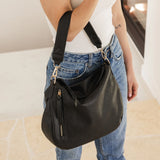 The Louenhide Nadia Shoulder Bag is your new go-to when your day calls for casual styling. Whether you’re running errands or heading off to lunch, the relaxed and slouchy silhouette allows you to fit all your essentials, while maintaining a compact and slender fit under your arm. With a bonus strap inside, completely customize your look from a comfortable shoulder bag to a practical crossbody. Make every day easy with this multi-wear everyday shoulder bag.