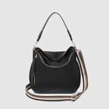 The Louenhide Nadia Shoulder Bag is your new go-to when your day calls for casual styling. Whether you’re running errands or heading off to lunch, the relaxed and slouchy silhouette allows you to fit all your essentials, while maintaining a compact and slender fit under your arm. With a bonus strap inside, completely customize your look from a comfortable shoulder bag to a practical crossbody. Make every day easy with this multi-wear everyday shoulder bag.