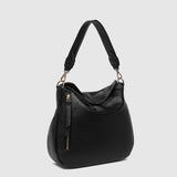 The Louenhide Nadia Shoulder Bag is your new go-to when your day calls for casual styling. Whether you’re running errands or heading off to lunch, the relaxed and slouchy silhouette allows you to fit all your essentials, while maintaining a compact and slender fit under your arm. With a bonus strap inside, completely customize your look from a comfortable shoulder bag to a practical crossbody. Make every day easy with this multi-wear everyday shoulder bag.