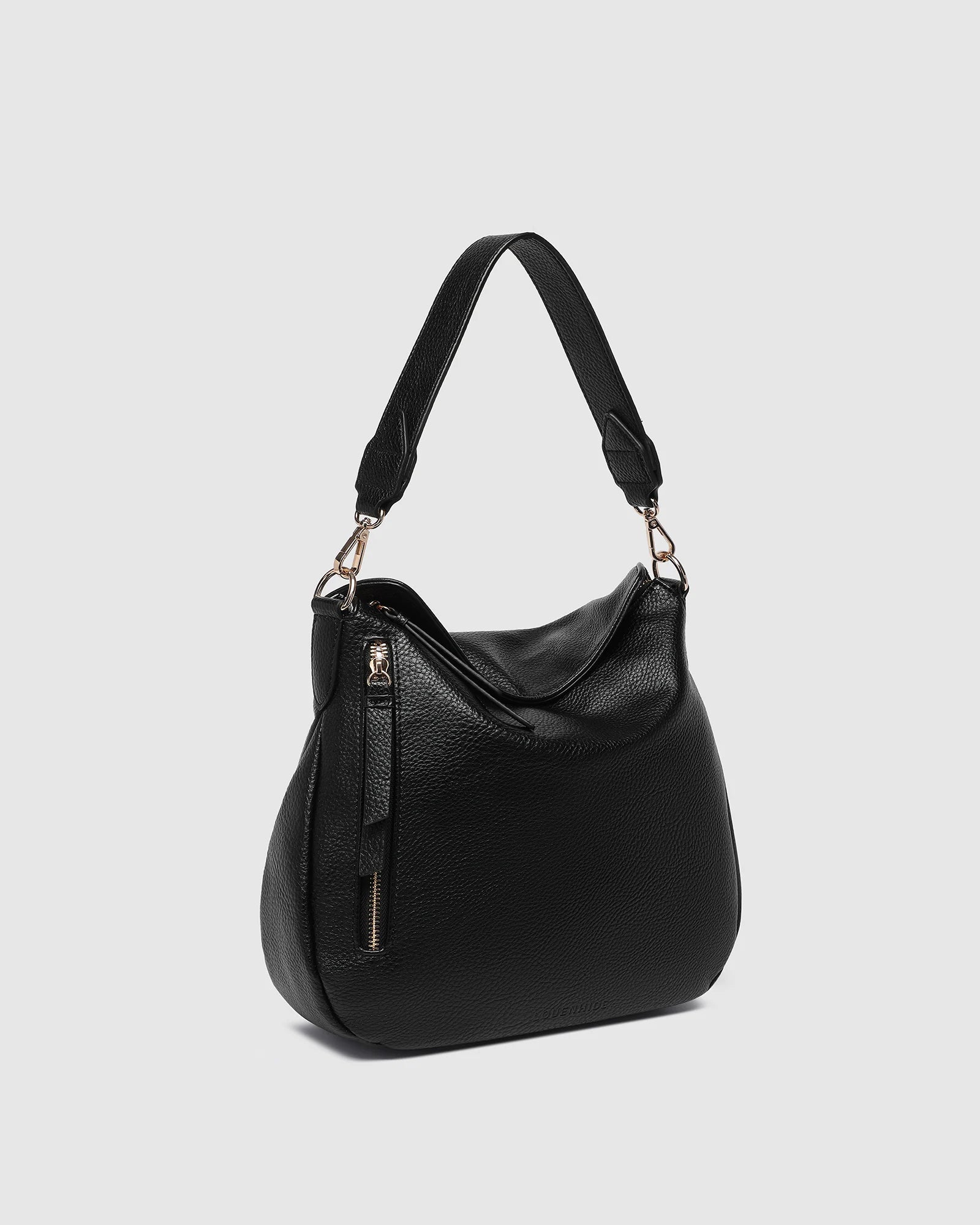 The Louenhide Nadia Shoulder Bag is your new go-to when your day calls for casual styling. Whether you’re running errands or heading off to lunch, the relaxed and slouchy silhouette allows you to fit all your essentials, while maintaining a compact and slender fit under your arm. With a bonus strap inside, completely customize your look from a comfortable shoulder bag to a practical crossbody. Make every day easy with this multi-wear everyday shoulder bag.