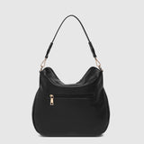 The Louenhide Nadia Shoulder Bag is your new go-to when your day calls for casual styling. Whether you’re running errands or heading off to lunch, the relaxed and slouchy silhouette allows you to fit all your essentials, while maintaining a compact and slender fit under your arm. With a bonus strap inside, completely customize your look from a comfortable shoulder bag to a practical crossbody. Make every day easy with this multi-wear everyday shoulder bag.