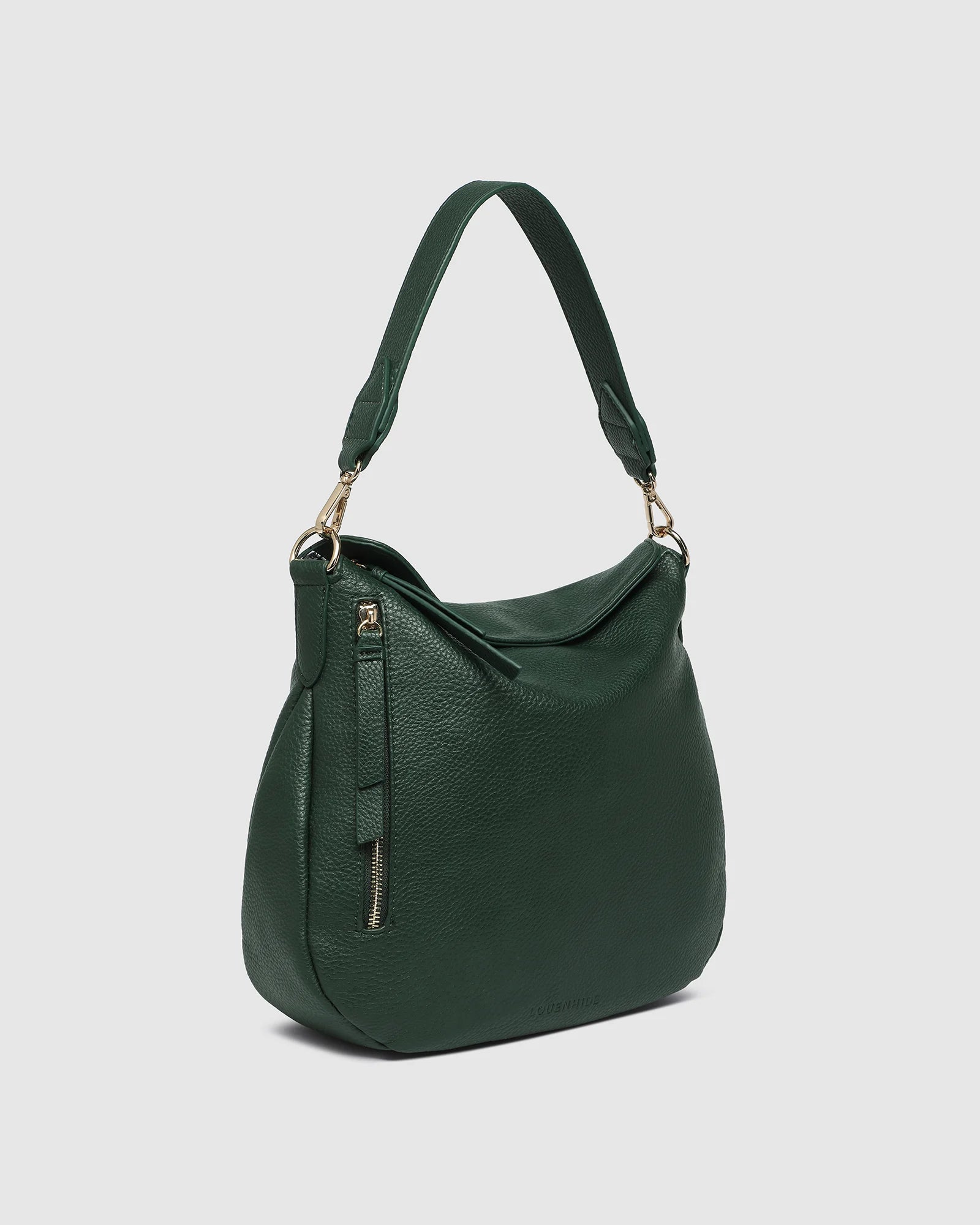 The Louenhide Nadia Shoulder Bag is your new go-to when your day calls for casual styling. Whether you’re running errands or heading off to lunch, the relaxed and slouchy silhouette allows you to fit all your essentials, while maintaining a compact and slender fit under your arm. With a bonus strap inside, completely customize your look from a comfortable shoulder bag to a practical crossbody. Make every day easy with this multi-wear everyday shoulder bag.