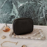 The Louenhide Rita Jewelry Case is the ideal travel accessory you didn't know you needed. Perfectly sized for travel, this women's jewellery case is a must-have for keeping your jewellery organized and protected on the go. Its sleek design fits effortlessly into your luggage or carry-on, while ensuring your accessories are always secure, organised and ready to shine. Say goodbye to tangled necklaces and lost earrings. With the ultimate internal organisation, there's a spot for everything. Whether you're jet