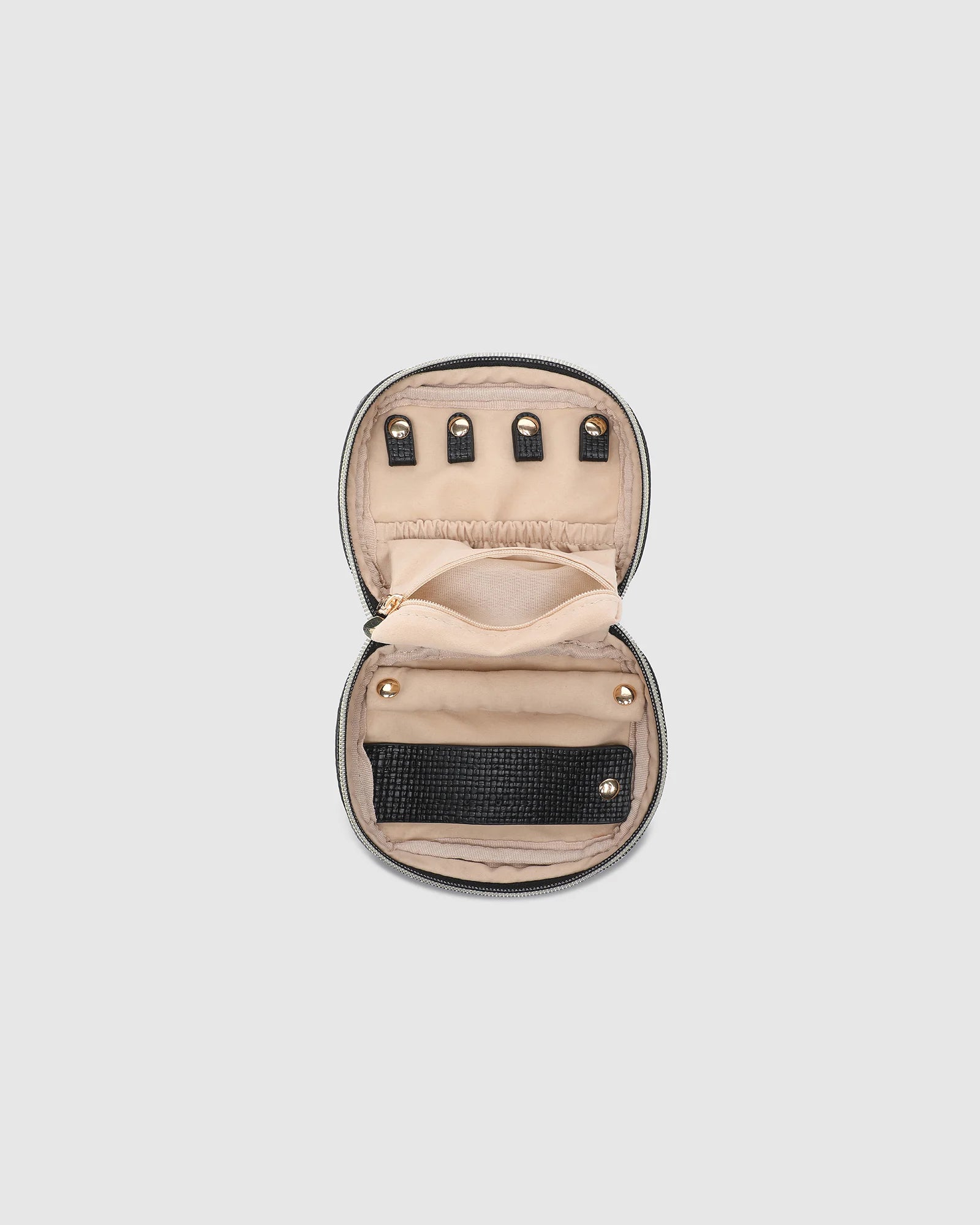 The Louenhide Rita Jewelry Case is the ideal travel accessory you didn't know you needed. Perfectly sized for travel, this women's jewellery case is a must-have for keeping your jewellery organized and protected on the go. Its sleek design fits effortlessly into your luggage or carry-on, while ensuring your accessories are always secure, organised and ready to shine. Say goodbye to tangled necklaces and lost earrings. With the ultimate internal organisation, there's a spot for everything. Whether you're jet