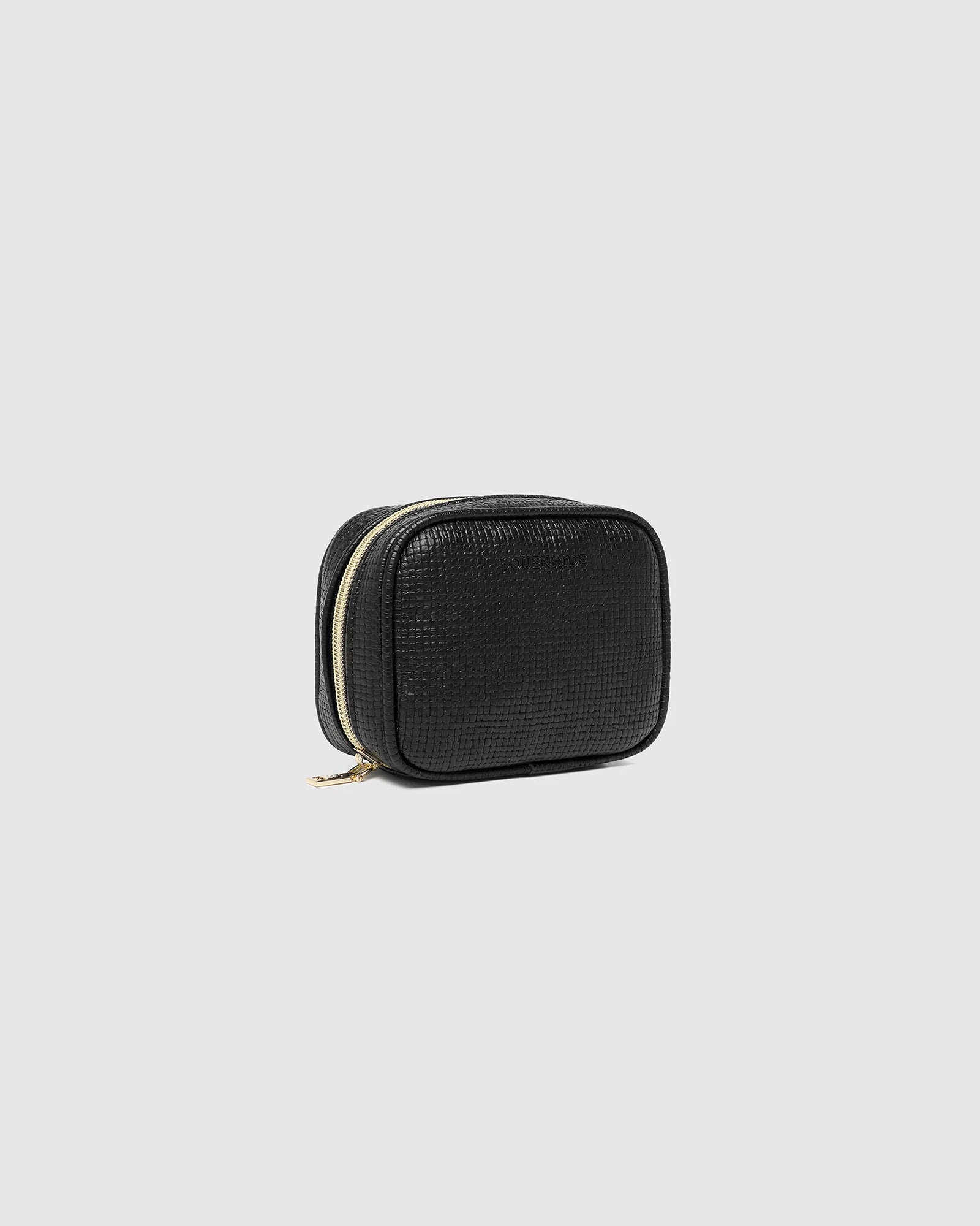 The Louenhide Rita Jewelry Case is the ideal travel accessory you didn't know you needed. Perfectly sized for travel, this women's jewellery case is a must-have for keeping your jewellery organized and protected on the go. Its sleek design fits effortlessly into your luggage or carry-on, while ensuring your accessories are always secure, organised and ready to shine. Say goodbye to tangled necklaces and lost earrings. With the ultimate internal organisation, there's a spot for everything. Whether you're jet
