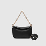 The Louenhide Saylor Crossbody Bag brings a bold yet refined edge to your everyday styling in a soft vegan leather finish. A sleek baguette-shaped silhouette, this cross body bag with chain detailing blends texture and refinement in all the right ways. Designed to be worn with ease but styled to stand out, the Saylor Black moves effortlessly from day to night, adding impact to your layered winter looks. Wherever the day leads, this chain strap handbag is the finishing touch that completes the look.