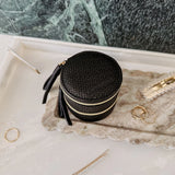 The Louenhide Sofia Jewelry Box is designed to hold and protect your most treasured pieces. Featuring a compact silhouette with two protective compartments, this multi-zipper case offers a streamlined way to store your jewellery without taking up unnecessary space. This travel jewellery case is the perfect addition to your bag, ensuring valuables stay secure and organised wherever the day leads.