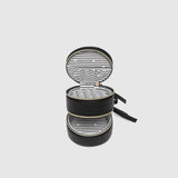 The Louenhide Sofia Jewelry Box is designed to hold and protect your most treasured pieces. Featuring a compact silhouette with two protective compartments, this multi-zipper case offers a streamlined way to store your jewellery without taking up unnecessary space. This travel jewellery case is the perfect addition to your bag, ensuring valuables stay secure and organised wherever the day leads.